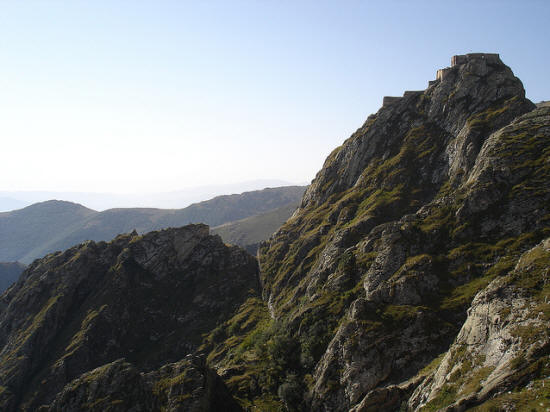 The citadel perched on the mountain top and its cascading walls