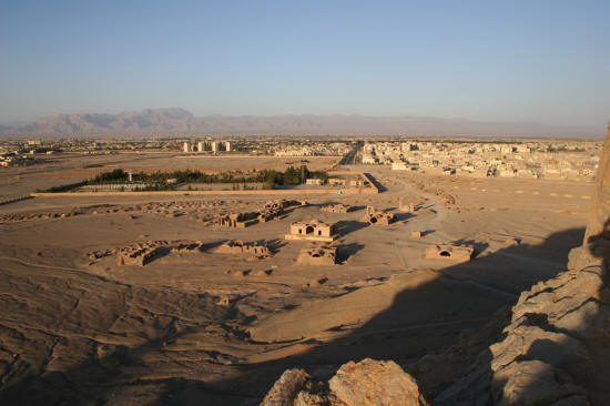 View from the towers looking north towards walled, treed cemetery and Yazd city