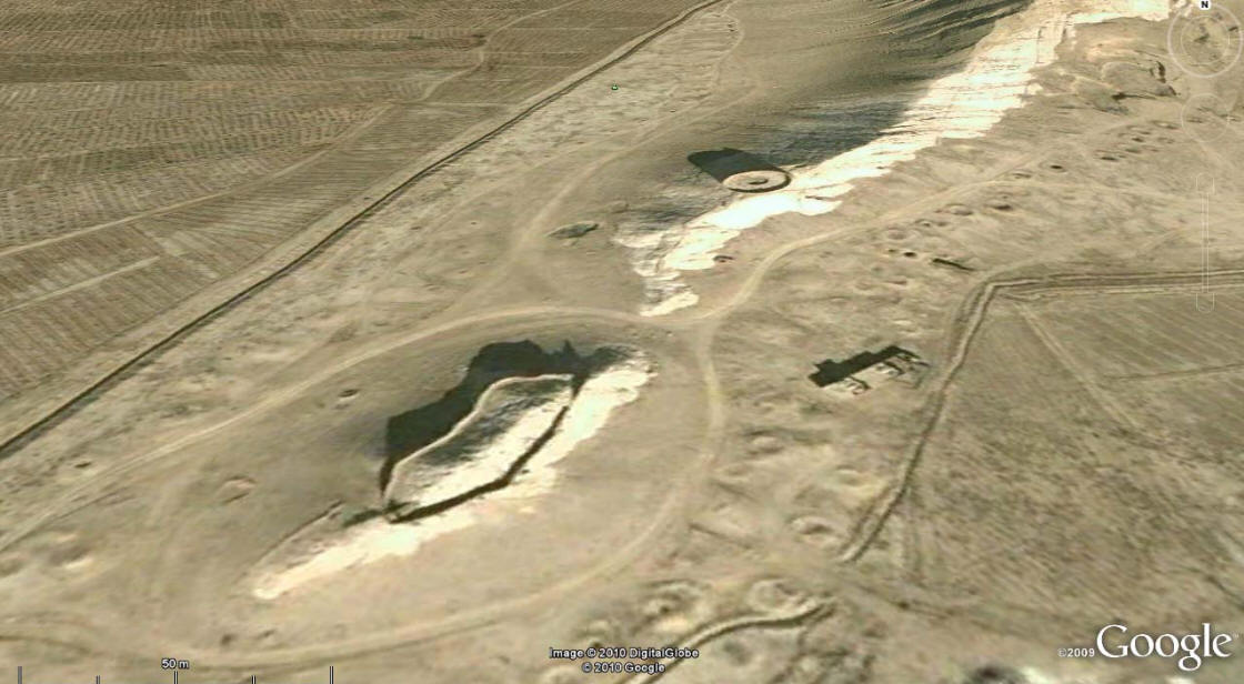 Aerial image of the Dakhma (circular structure) and adjacent walled structure (lower left)