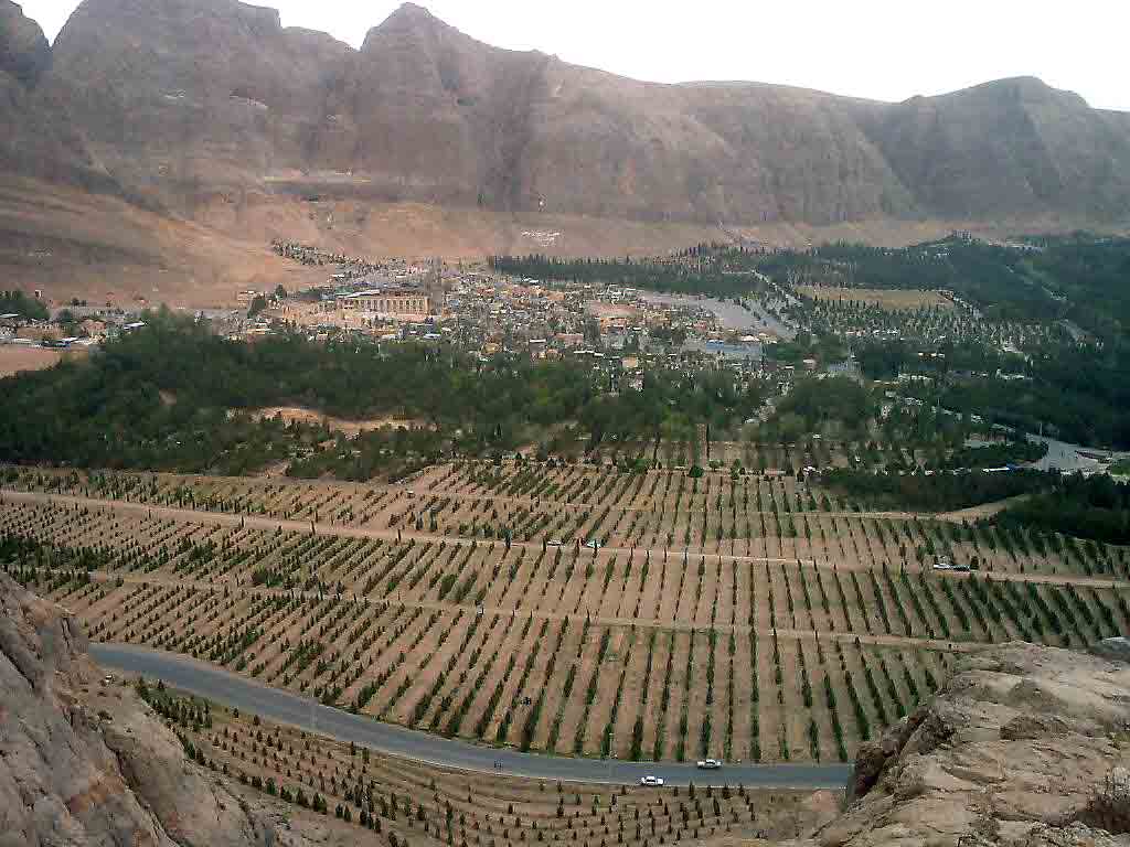 View of an eastern suburb of Kerman city, the Jangal-e Ghaem (Ghaem Forest), and the Saheb Zaman mountains