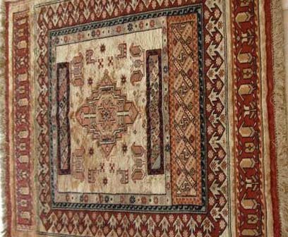 Quchan carpet with kilim embroidery