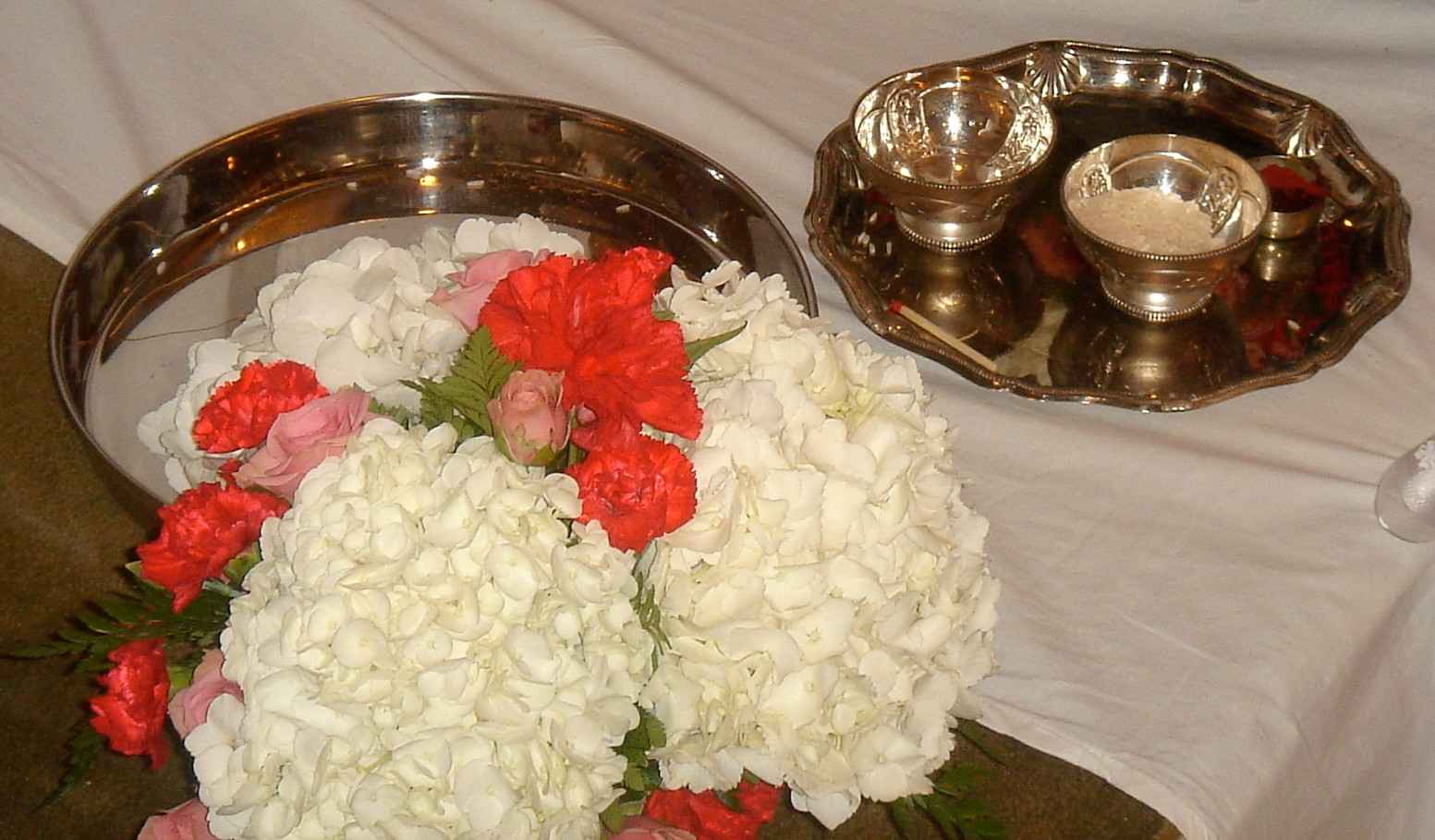 Trays containing rose petal<br>and other items