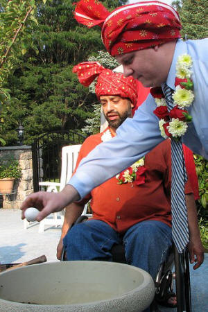 Preparing to plant the sapling Placing an egg in the pot
