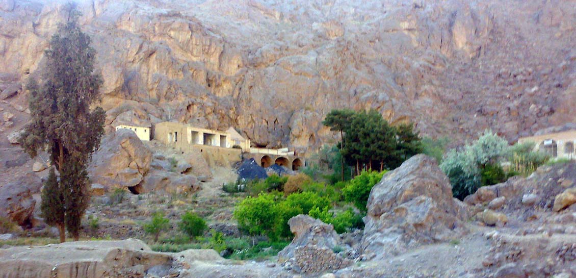 Pir-e Narestaneh at the mountain rock face base