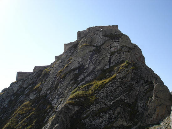 The citadel perched on the mountain top and its cascading walls