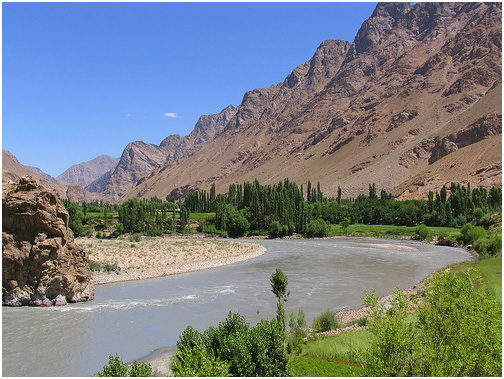 Panj River's Wakhan Valley & farms. The Panj River is called the Amu Darya (Oxus) in Afghanistan